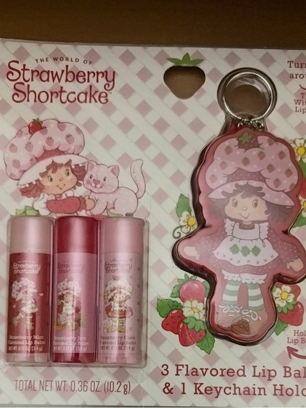 3-Pack Flavored Lip Balm Set in Pink and Keychain of strawberry shortcake